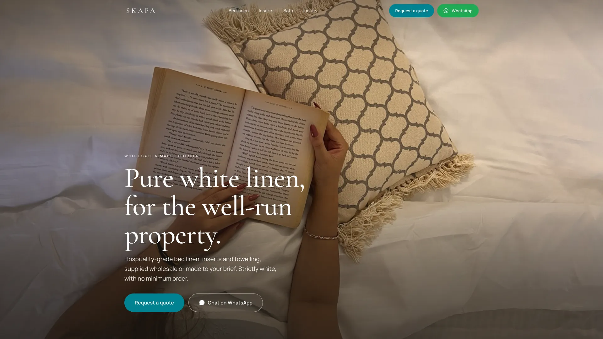 Skapa Linens hero — a calm bedroom scene with the headline 'Pure white linen, for the well-run property' and Request a quote and WhatsApp calls to action.